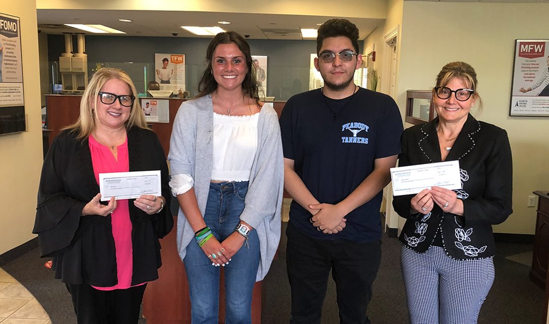 Photo of North Shore Bank awarding Peabody High School student scholarships