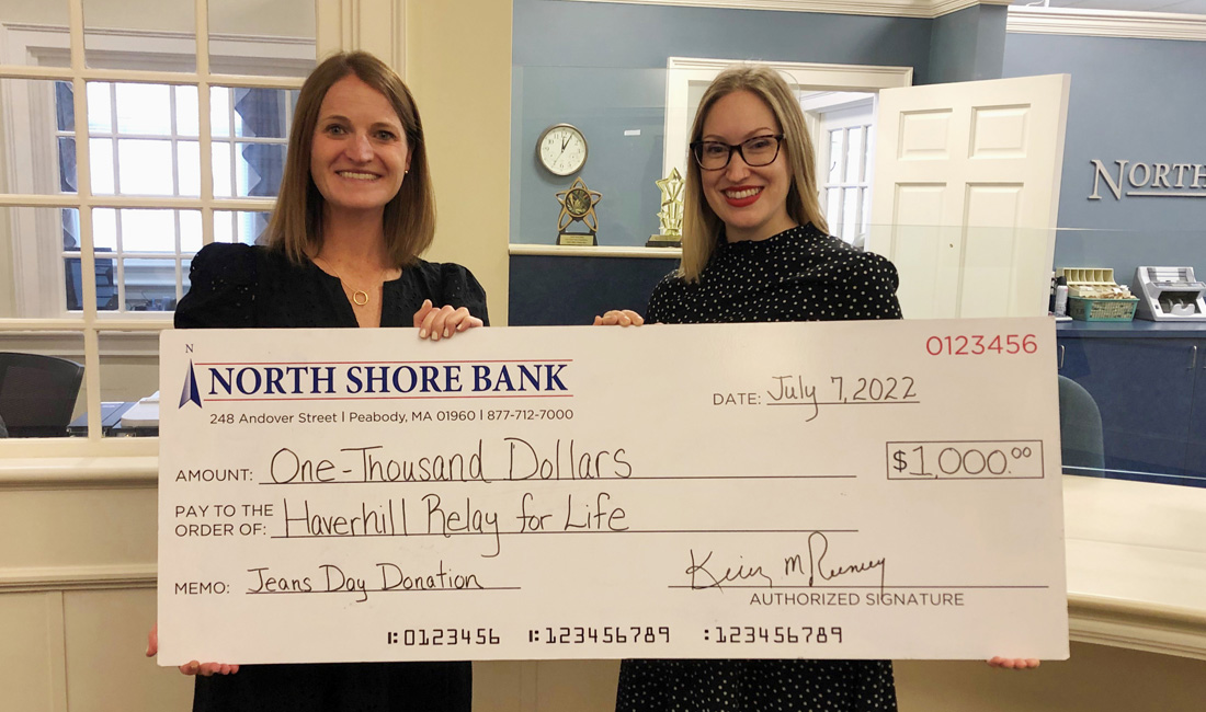 Photo of North Shore Bank presenting the American Cancer Society's Haverhill Relay for Life with a $1,000 Jeans Day check.