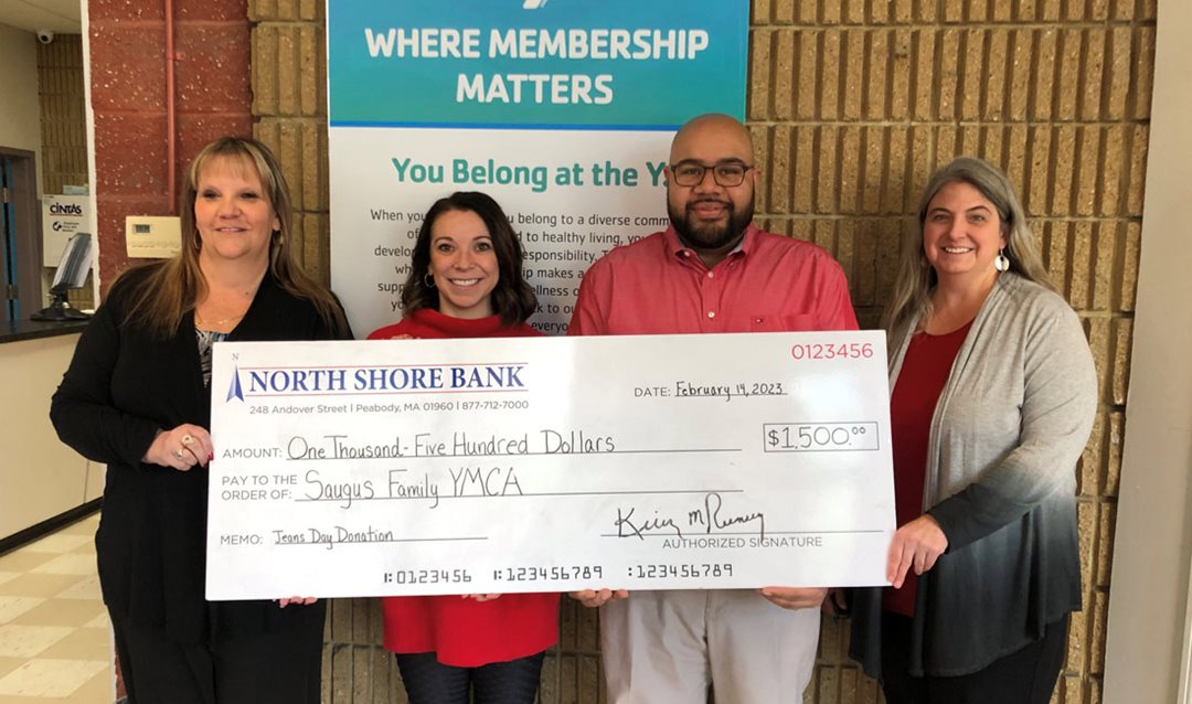 Photo of North Shore Bank presenting the Saugus Family YMCA with a $1,500 Jeans Day check.