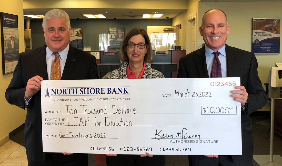 Photo of Noth Shore Bank presenting a $10,000 donation to the LEAP for Education Great Expectations Event