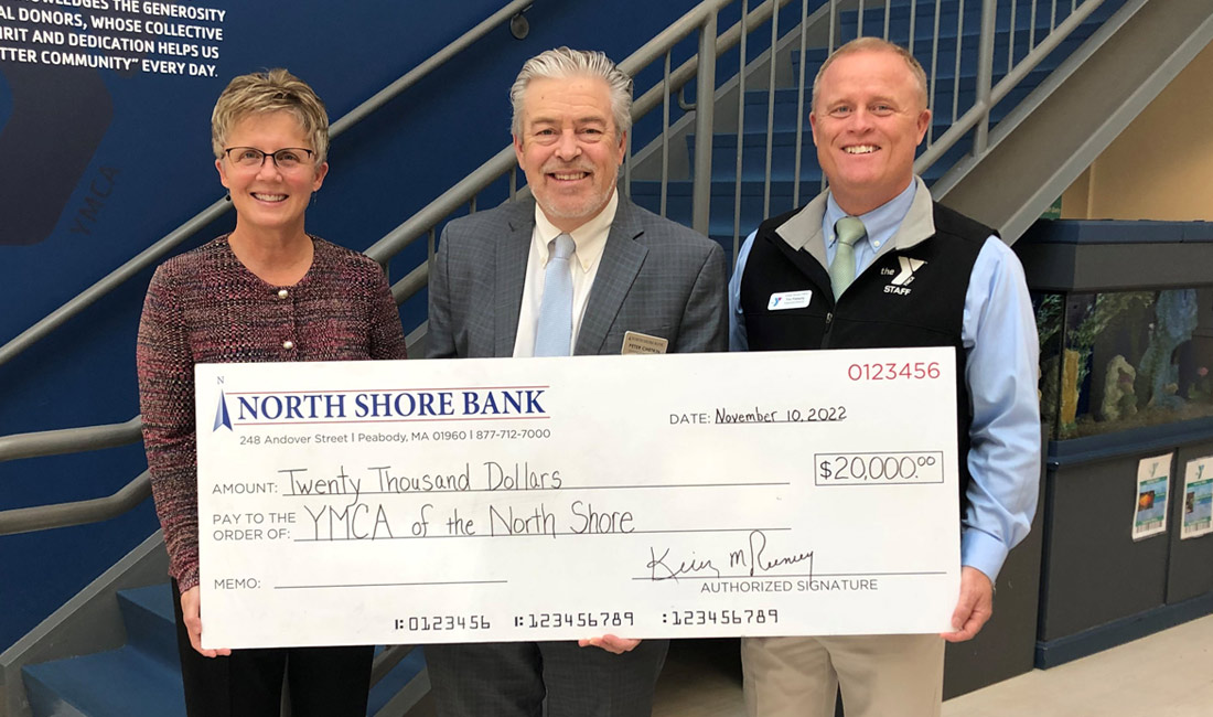 Photo of North Shore Bank presenting their annual commitment to the YMCA of the North Shore Corner Stone program