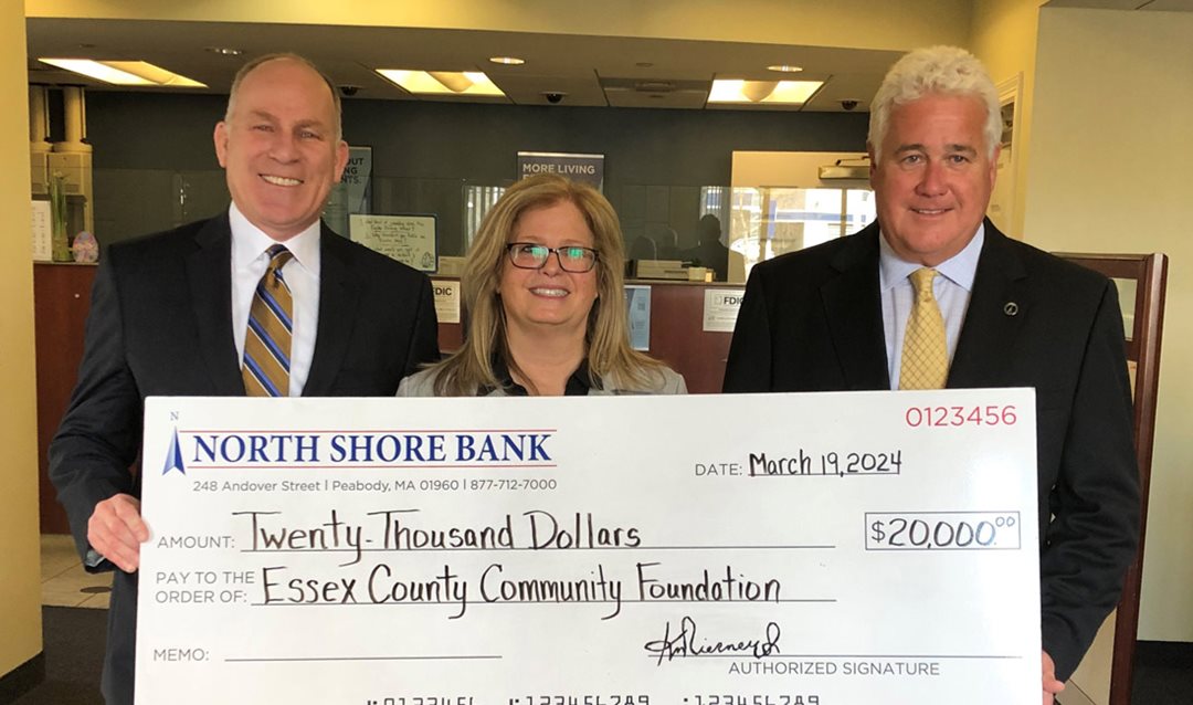 Photograph of North Shore Bank making a $20,000 commitment to the ECCF Corporate Partner Program