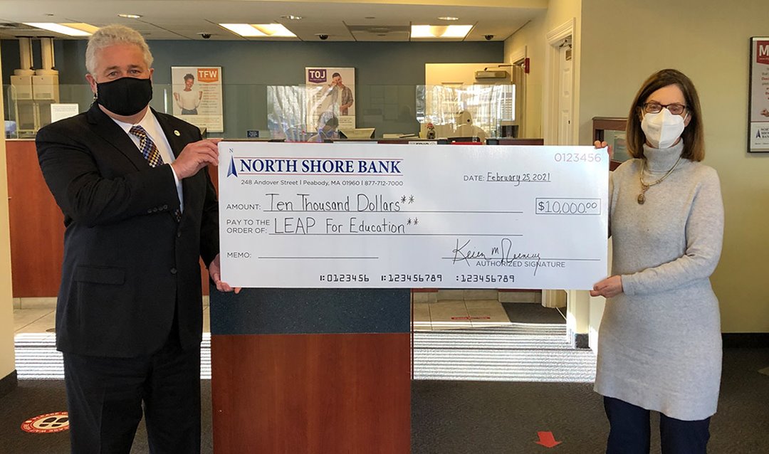 Photo of North Shore Bank presenting LEAP for Education with a contribution towards their annual Great Expectations event.