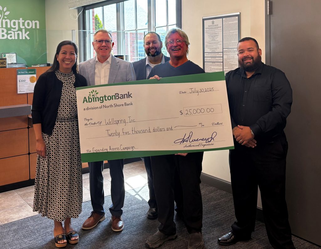 A check presentation for Wellspring Multi-Service Centers.