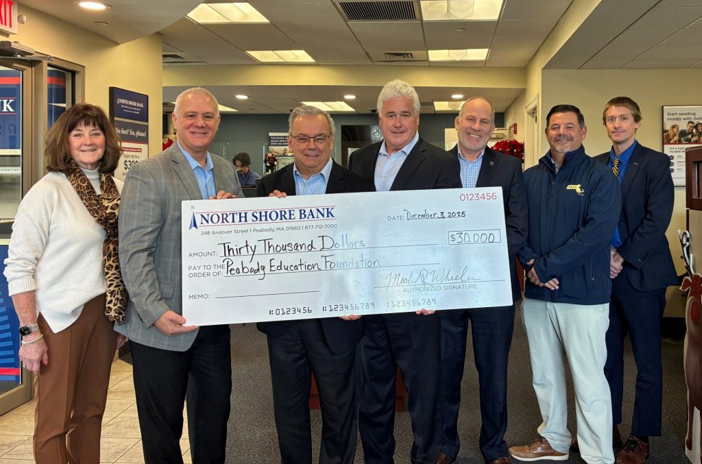 Check donation to Peabody Education Foundation.